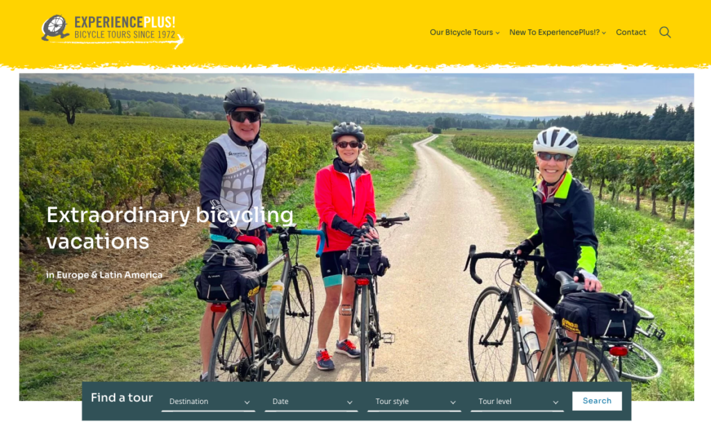 Homepage for ExperiencePlus!, featuring three cyclists posing for a photo with beautiful countryside all around them.